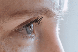 Womans eye after blepharoplasty surgery in Belgravia with Jonathan Dunnne