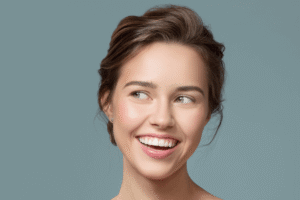 Woman smiling post surgery in Belgravia with Jonathan Dunne